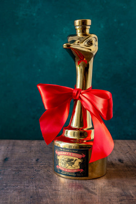Golden Ostrich with ribbon